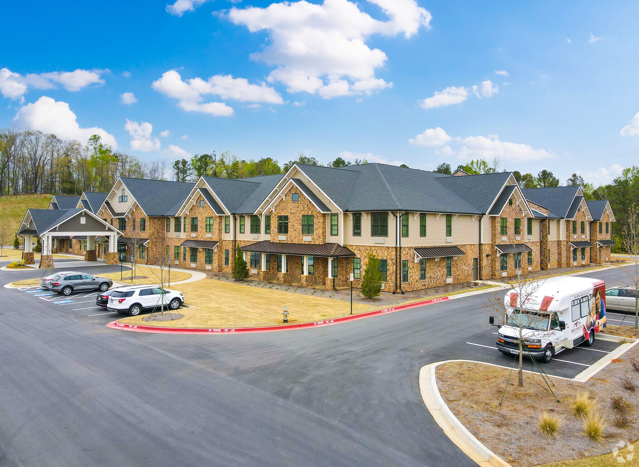 Brickmont of West Cobb exterior with community shuttle in Marietta, GA