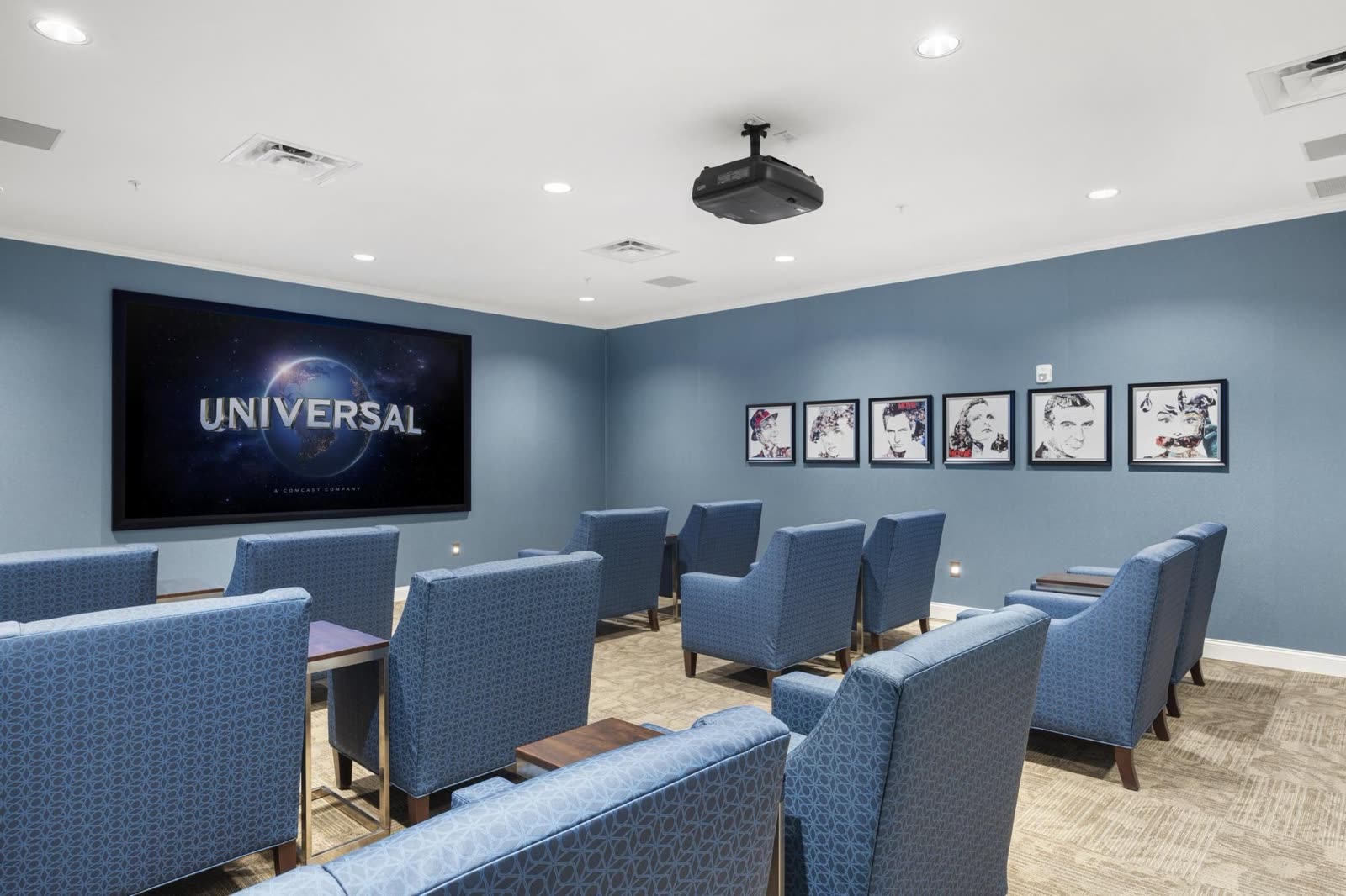 Movie theater with lounge seating at Brickmont of Woodstock in Woodstock, GA